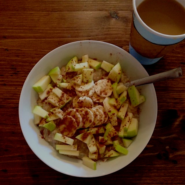 Keeping warm on this chilly morning: toasted oats w diced apple, banana, and cinnamon. Tea au lai...