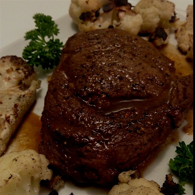 Bison cooked with #beer, potatoes in duck fat and burnt cauliflower with fried capers. Robb makin...