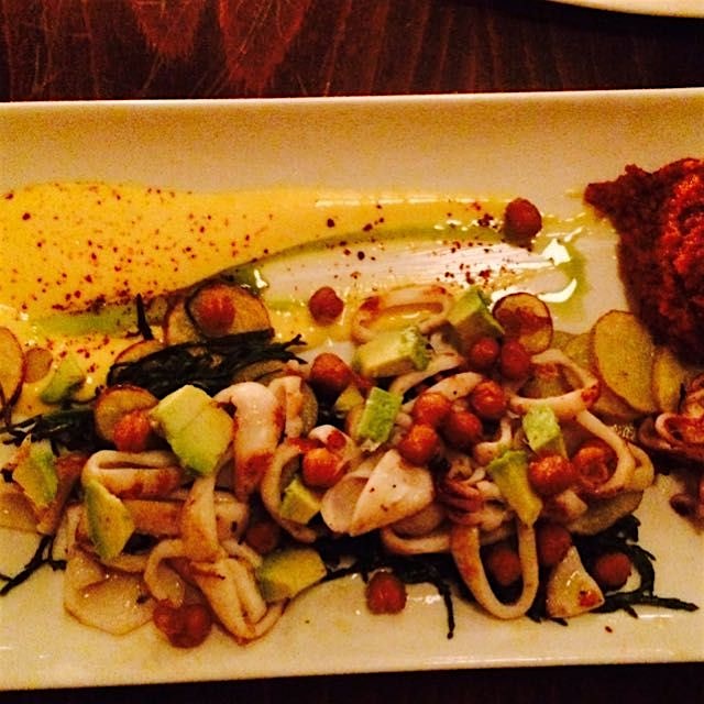 Fresh squid salad with roasted chickpeas and parsnip purée. The chef here is a champion of farmer...