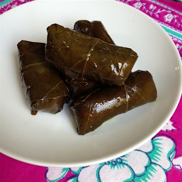 Dolmas - Vegan Stuffed Grape Leaves - recipe on our Facebook page: Vegan Foods = Joy! 