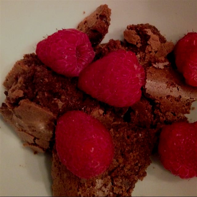 Homemade Almond flour brownies with raspberries.