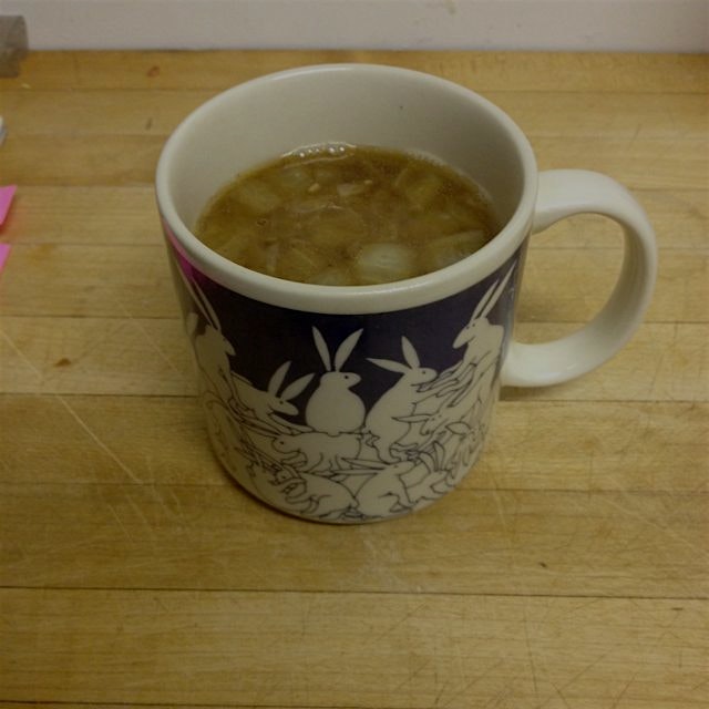 Mug of gingery bone broth for a frigid evening