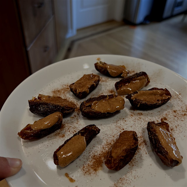Pitted dates, a dollop of unsalted peanut butter, and a dash of cinnamon. The kids will eat these...