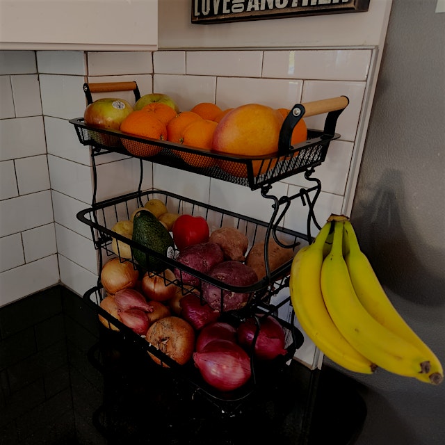 Using a tiered produce storage basket like this not only looks nice, but helps you store and trac...