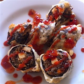 Tempura fried roll with baked tofu and rice noodles.