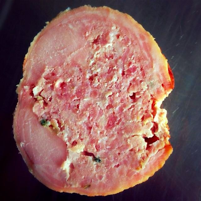 Boneless rack of rabbit with more rabbit inside. 