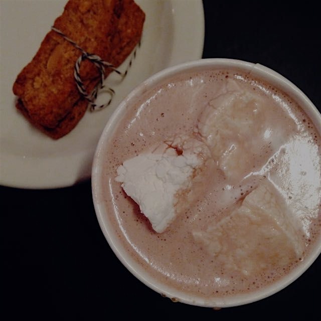 Hot chocolate with almond milk, homemade marshmallows, and gluten-free burgundette