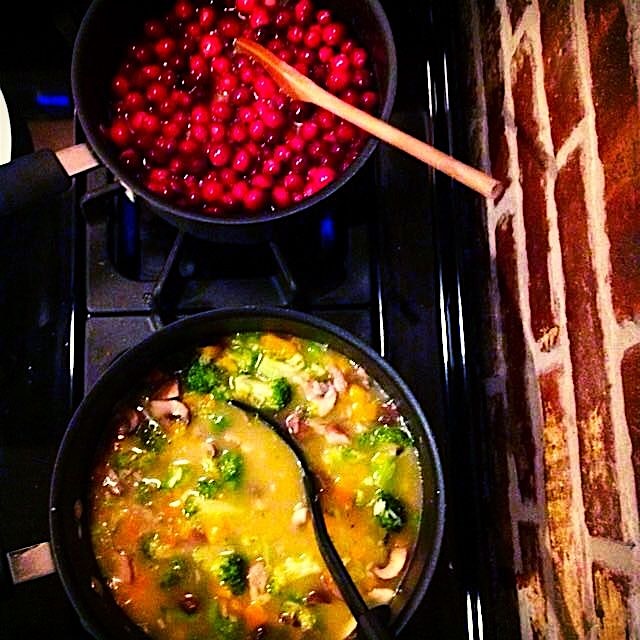 Double burners preparing food with love! Cranberry orange sauce for #Friendsgiving @ work (w/Brie...