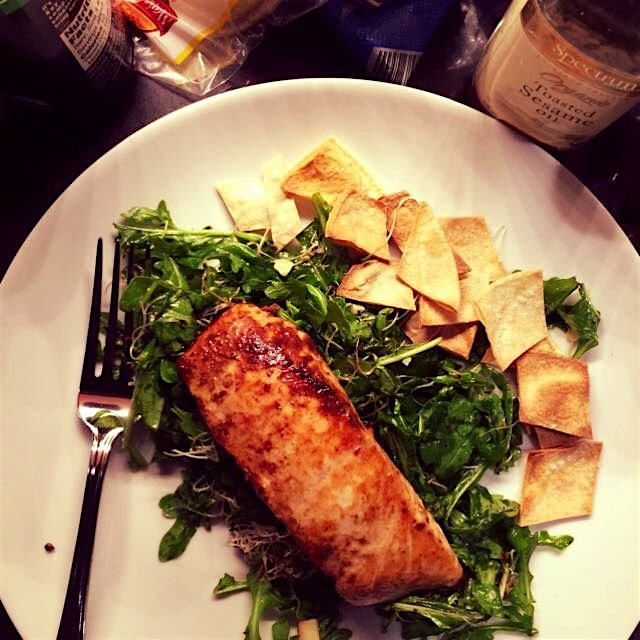Pre-tgiving feast of soy ginger salmon on arugula. Keeping light before we stuff our faces tomorr...