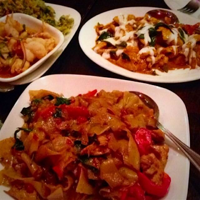 SriPraPhai panang, drunken noodles, and watercress salad. 
