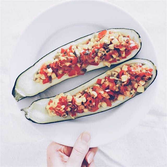 Baked courgettes stuffed with spiced mexican veggies 