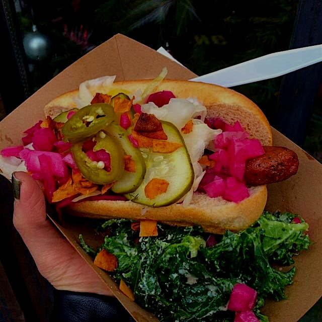 @yeahdawgnyc handmade vegan hot dogs loaded with homemade coconut bacon, pickles, kraut, and kale...