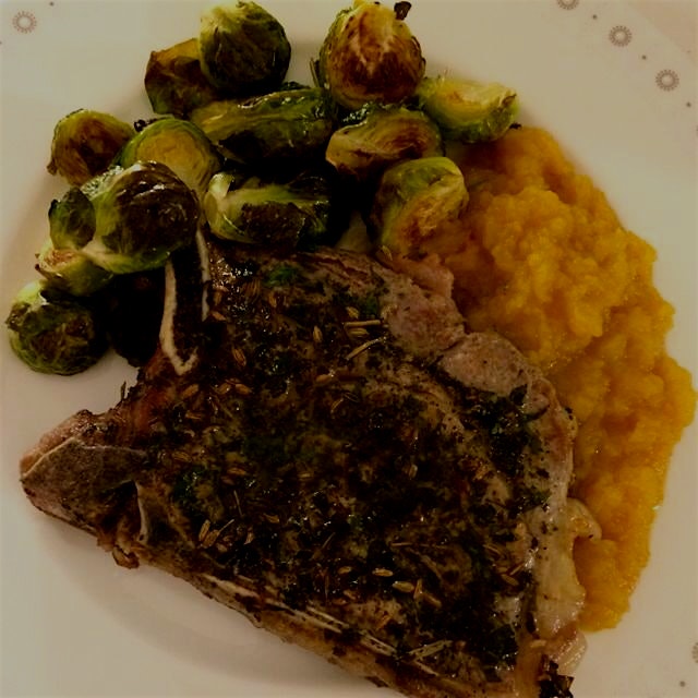 fennel seed and herb-crusted pork chop, pumpkin caramel apple sauce, brussels sprouts... dinner