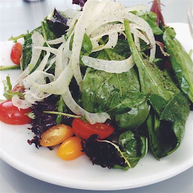 Lunch in the MFA courtyard: mixed greens, shaved fennel, & heirloom tomatoes in a balsamic vinaig...