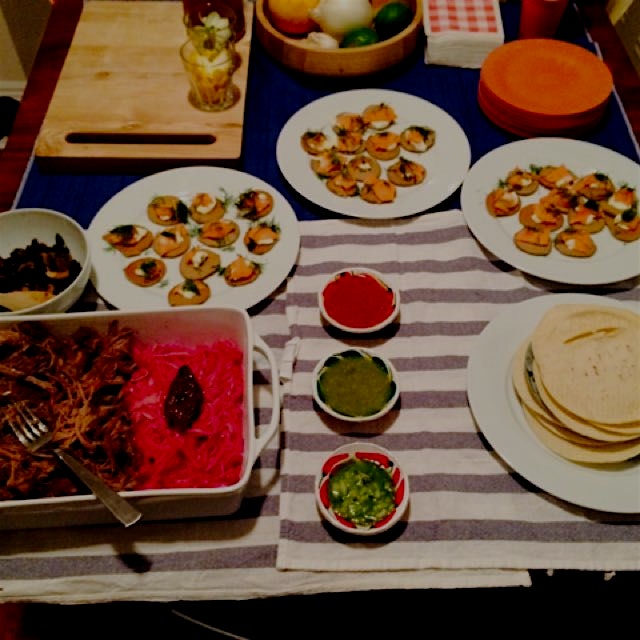 Holiday brisket tacos with pickled onions, buckwheat blinis with smoked salmon and creme fraiche....