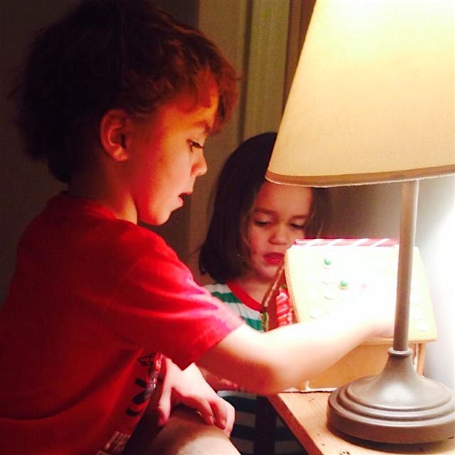 Sneaking bites of the gingerbread house when they thought no one was looking.  #foodpeeps