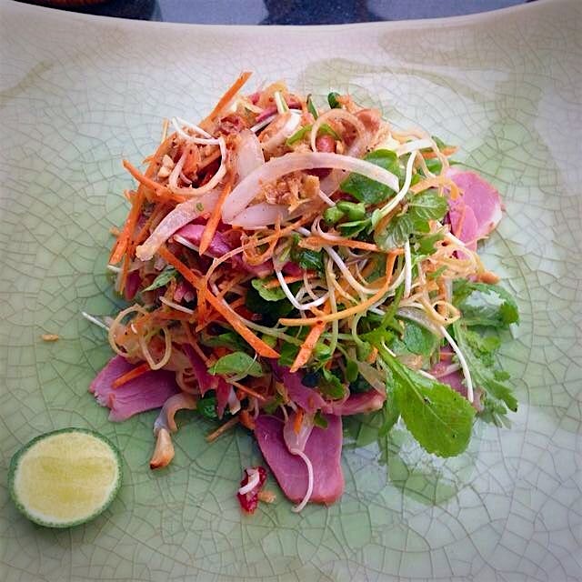 Banana blossom salad with mint and smoked duck