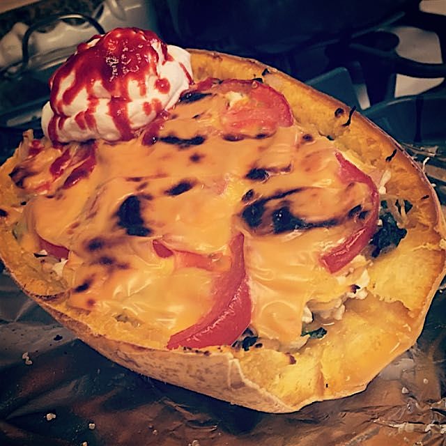 mmmm baked spaghetti squash with veggies and cottage cheese. topped with more cheese, Fage, and S...