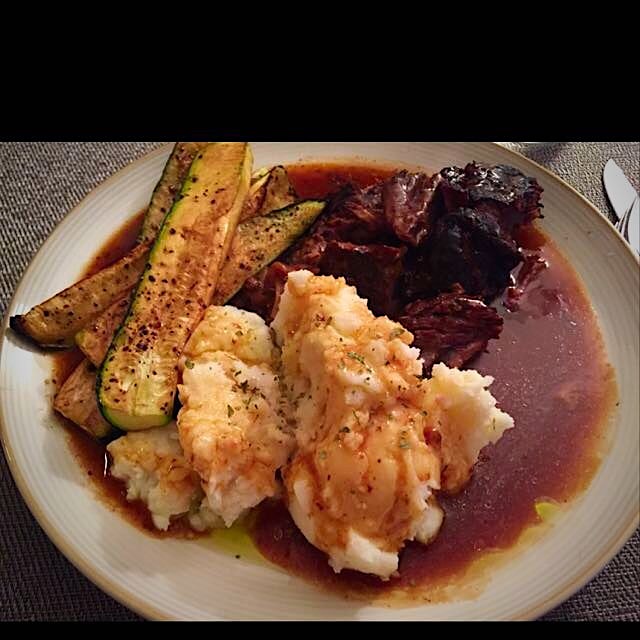 Homemade pot roast with red potato mash and zucchinis