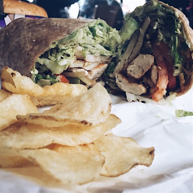The Baja chicken wrap with salt n vinegar "dirty" chips at Board & Brew in Del Mar, CA, est. 1979.