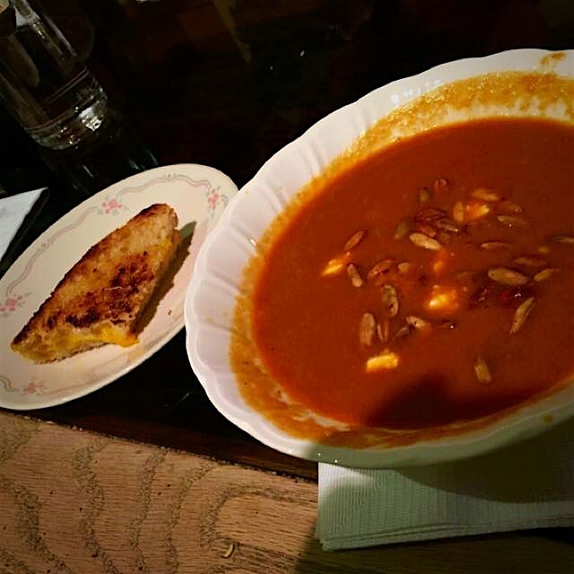 Chipotle red pepper soup with a side of grilled cheese