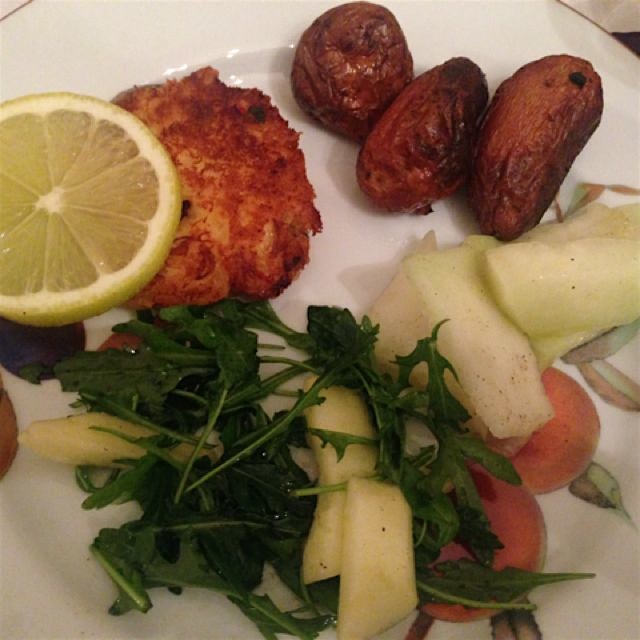Random NYE plate: crab cakes with paprika and tarragon, kohlrabi +olive oil and lemon, arugula an...