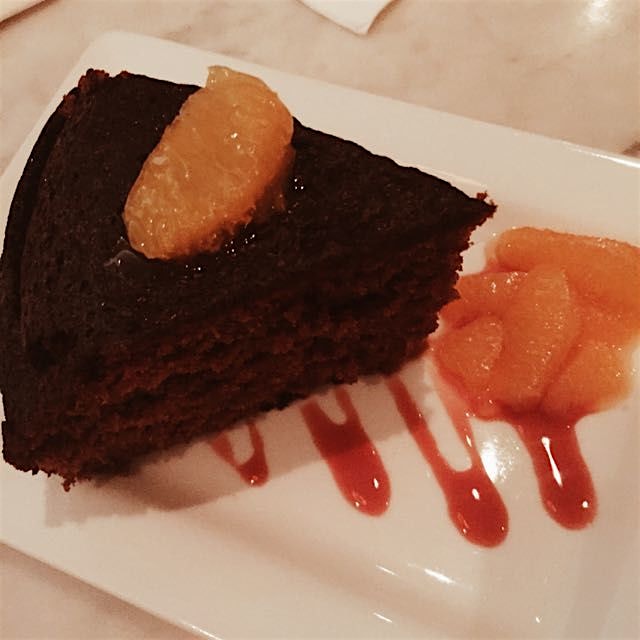 Ginger cake w/ blood oranges. When this arrived, the man sitting next to me asked if my New Year'...