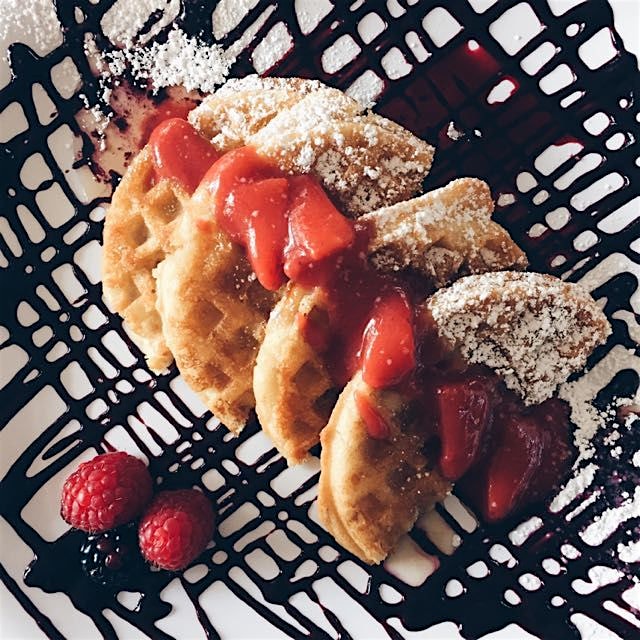 Gluten-free waffles with berry compote.
