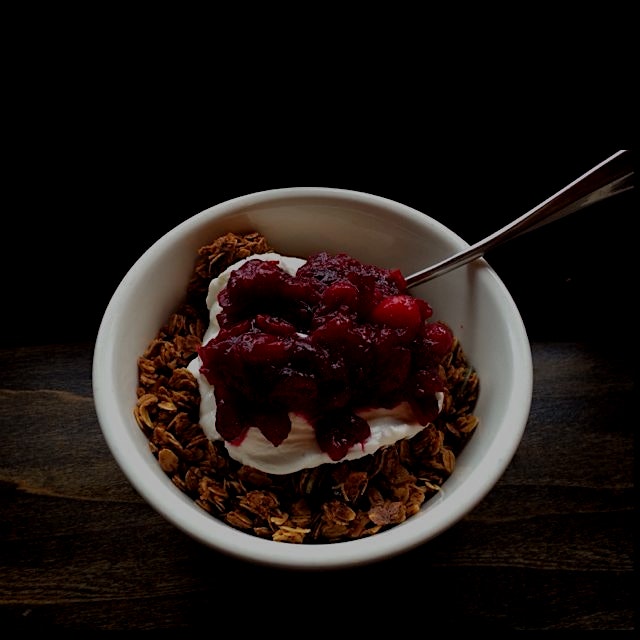 Beautiful blueberry granola and yogurt with cranberry compote at Bluebird Coffee