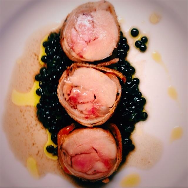 Rabbit Saddle , Lentils cooked in Chaga broth. 