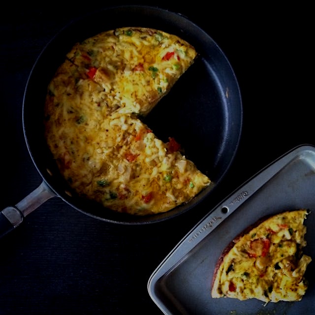 A ginormous spanish tortilla with curried vegetables & tons of chili! A girl has to warm up on a ...