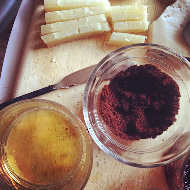 Manchego cheese dipped in a little honey and coffee grains is a wonderful and tasty little appeti...