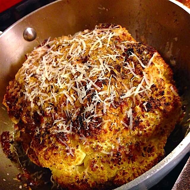 Cauliflower roasted whole rubbed with garlic and pecorino. 