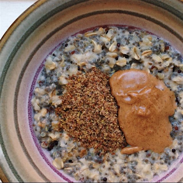 Chia & quinoa oatmeal with raisins, almond butter & flaxseed meal