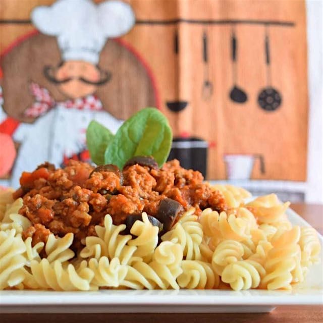 Healthy, easy, hearty spaghetti sauce, served over brown rice/quinoa noodles. Search for it on th...