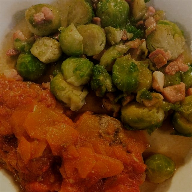 Beef pot roast with tomato sauce and brussels sprouts with bacon and maple syrup! 