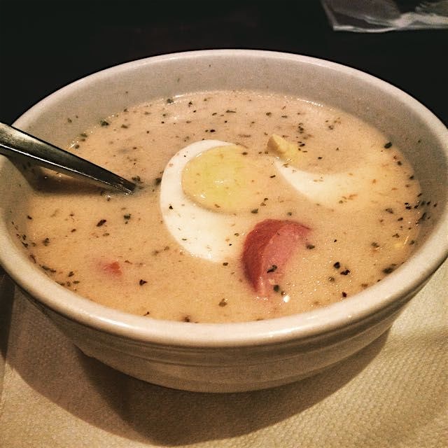 A bowl of Zurek at La Polonez, Polish restaurant in Toronto. Soup that tastes like sourdough brea...