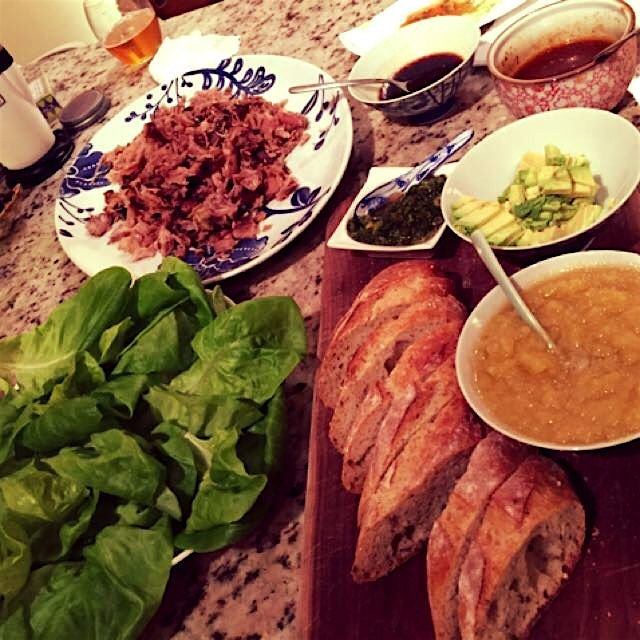 Traditional Bo ssam beer dinner. Kimchi purée, brown sugar pork butt