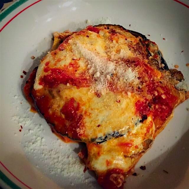 Snow day eggplant pie with roasted eggplant, fresh mozzarella, pecorino, Arrabbiata 