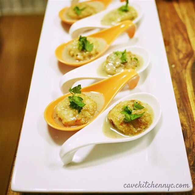 Bites of lemongrass shrimp balls in coconut coriander broth. Made with wild Argentinian shrimp wi...