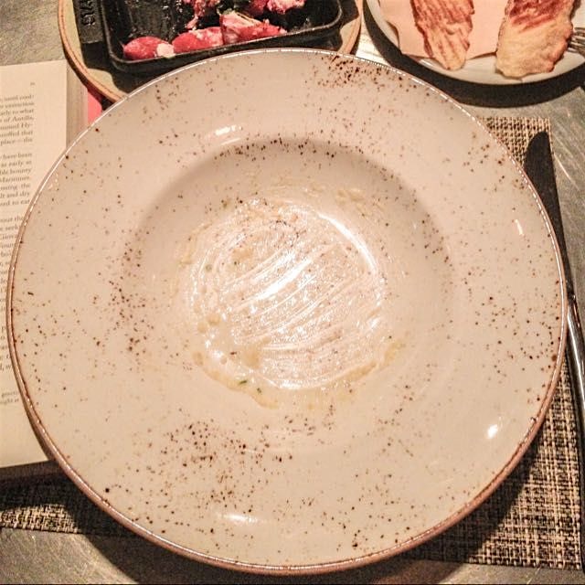 All that remained of the Anson Mills polenta I was happy to find on the menu tonight at Fig in Sa...