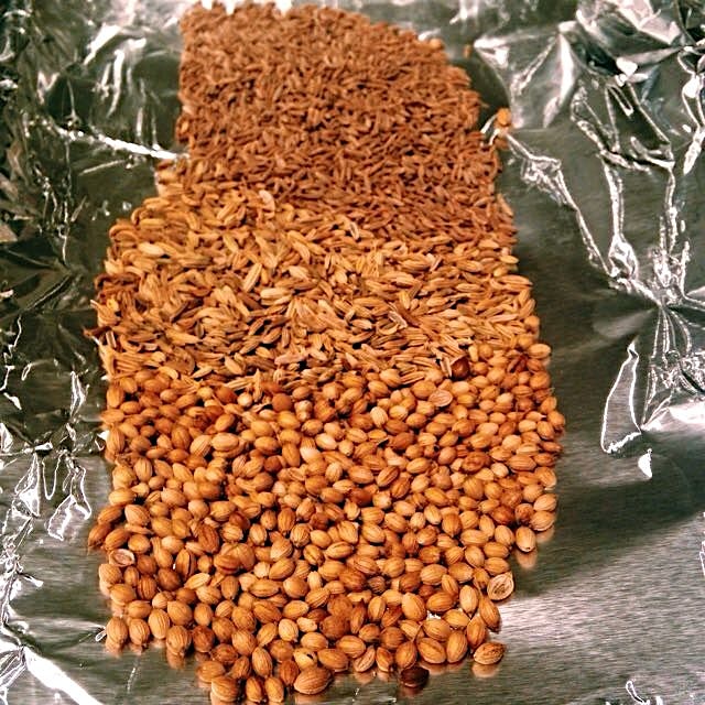 Toasting coriander, fennel and cumin for chicken satay. 