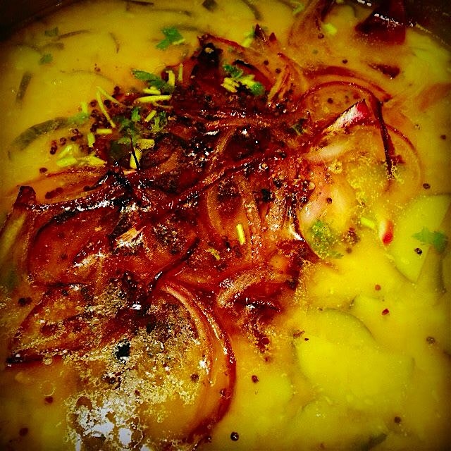 One of The Husband's favorite at-home meals ever. Dhall - a warm and hearty lentil and vegetable ...