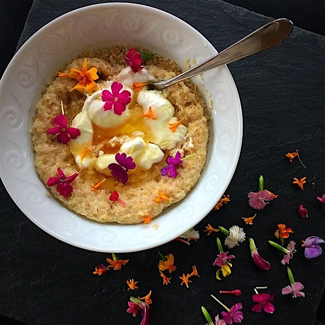 Gluten-free old fashioned rolled oats, Greek yogurt, Tupelo honey, and micro organic edible flowe...