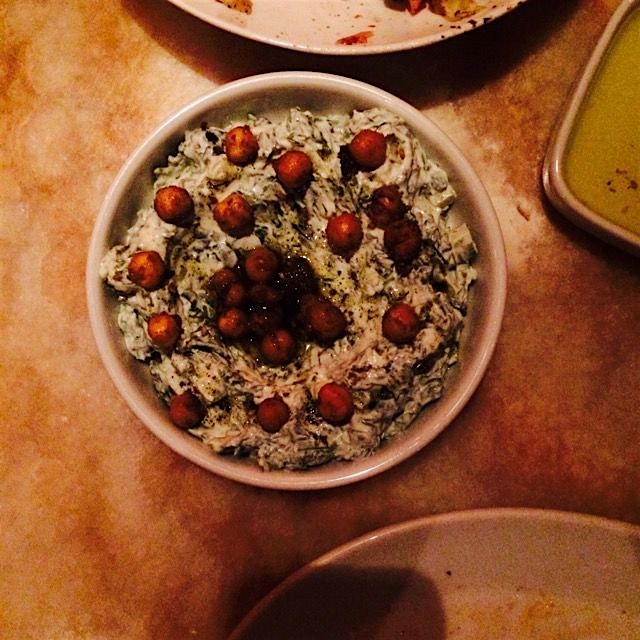 Cacik made with plain yogurt, chickpeas, spinach, and sumac. The crunch from the chickpeas just m...