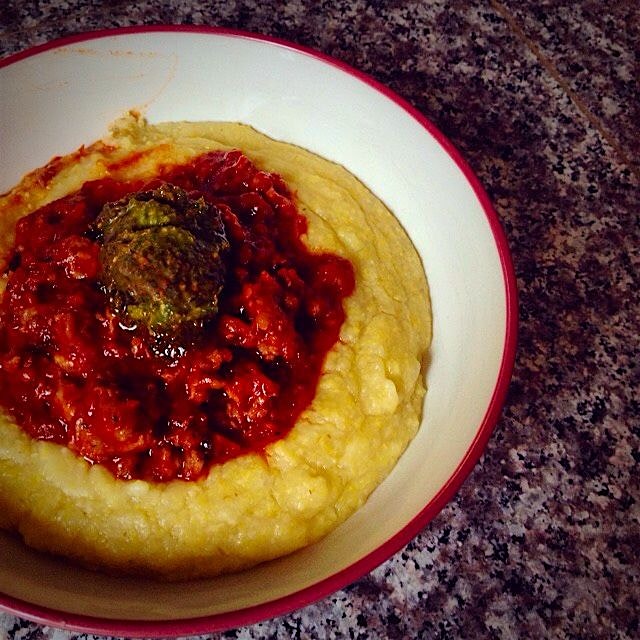 A favorite comfort food {polenta with sausage gravy and fresh pesto}