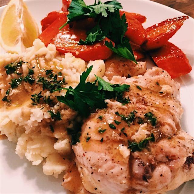 Pan seared chicken, olive oil smashed potatoes, maple glazed carrots with thyme gravy