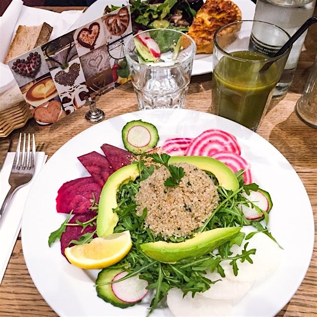 Detox salad with rucola, beetroots, avocado, quinoa, cucumber, white radish. And a detox juice (c...