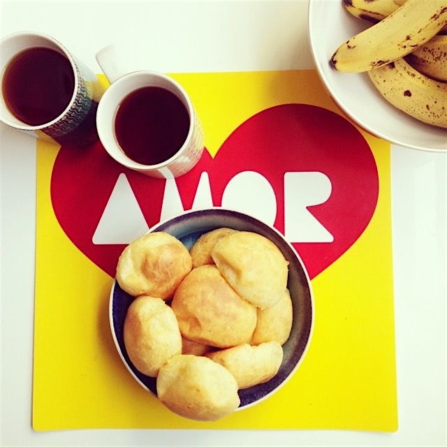 delicious homemade pão de queijo (Brazilian cheese bread). my husband made it from scratch with i...