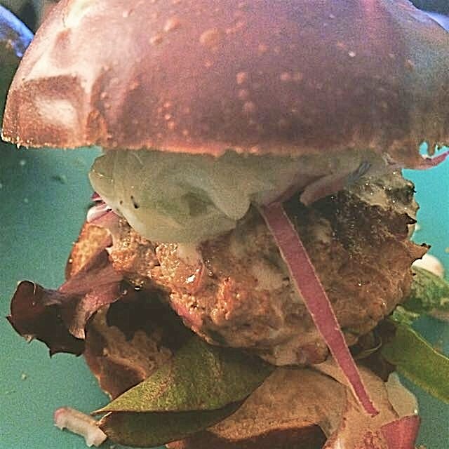 Pistachio Lamb Burger on a Pretzel bun. So delicious and comforting